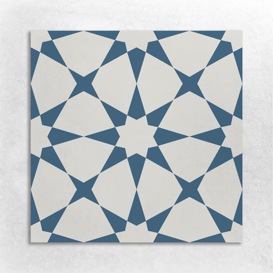 8x8 cement tile with a Moroccan star pattern in blue in white 