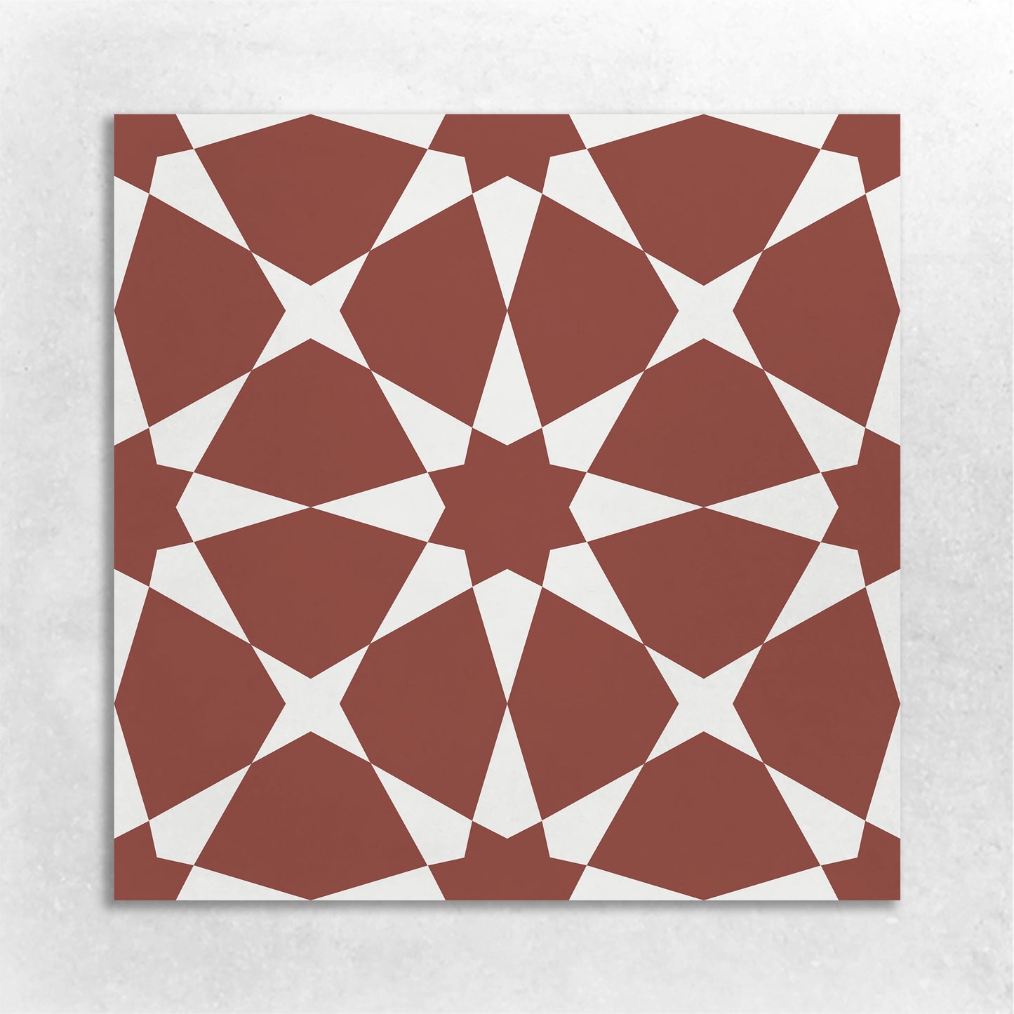 8x8 cement tile with a Moroccan star pattern in red and white colors